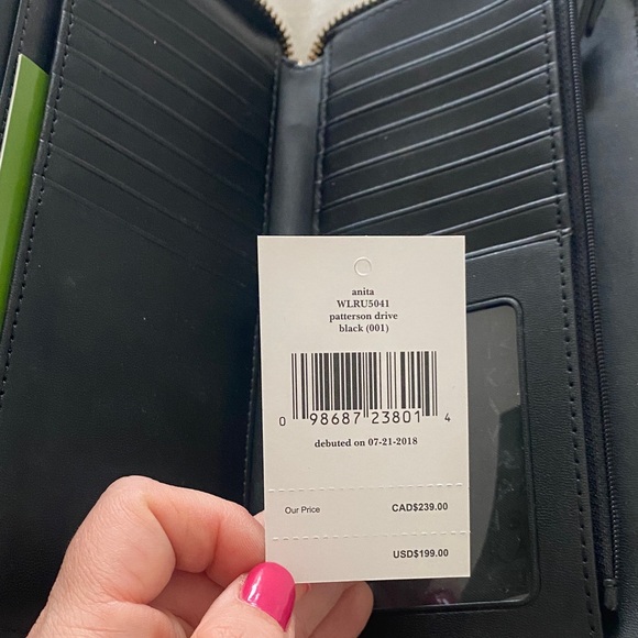 Kate Spade Black Wristlet with Gold Accents - Picture 6 of 10